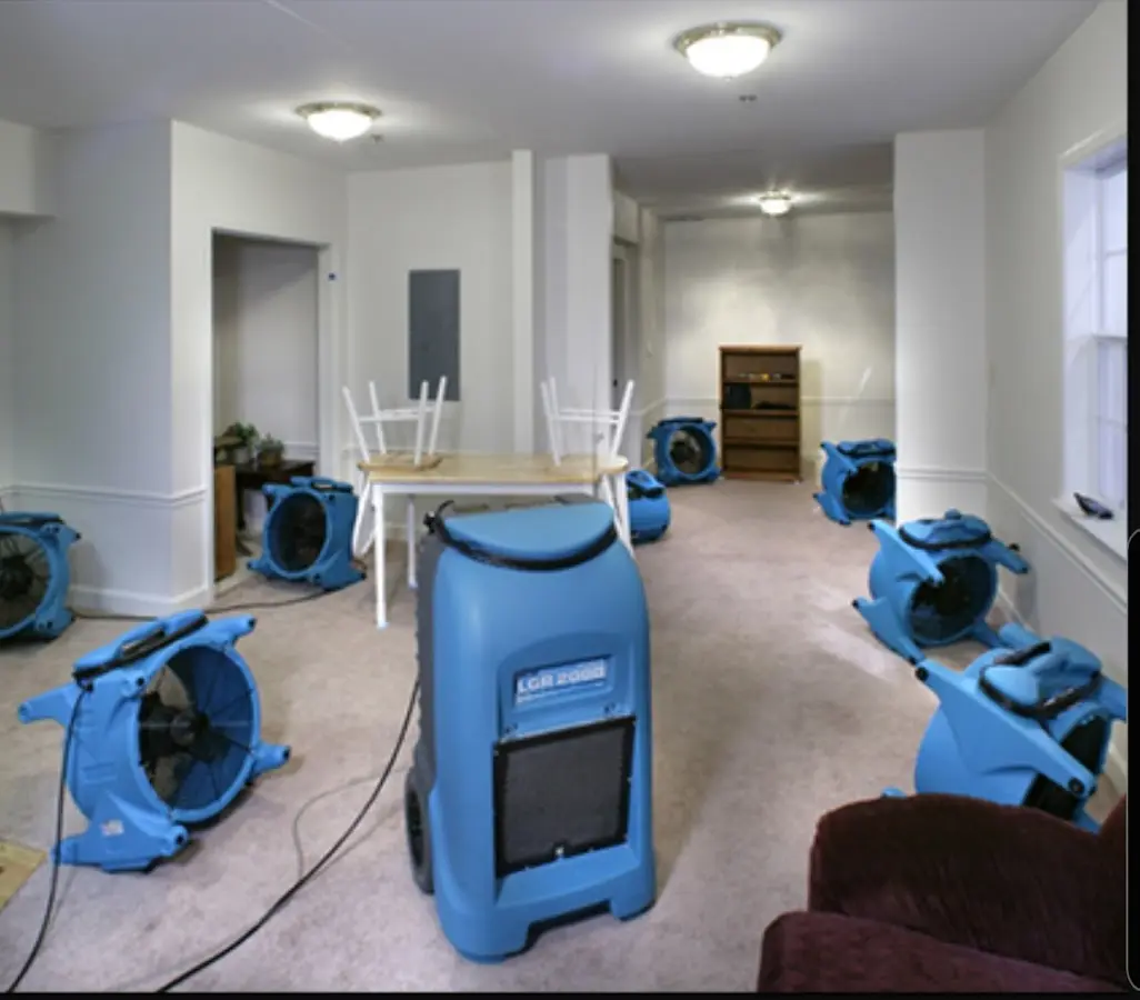 Air movers and dehumidifier setup for Water Damage Restoration in Pikeville